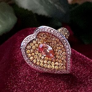 Pink topaz , zirconia.  Statement Ring custom made.